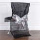 Housse de chaise (x1) avec nœud métallisé noir / argent