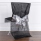 Housses de chaise (x4) avec nœud métallisé noir / argent