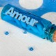 Mots « AMOUR » sur sticker turquoise