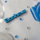 Mots « BONHEUR » sur sticker turquoise