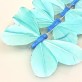 Papillons unis sur tige (x6) turquoise